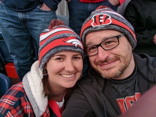 Ursula and her husband Luke enjoying a football game